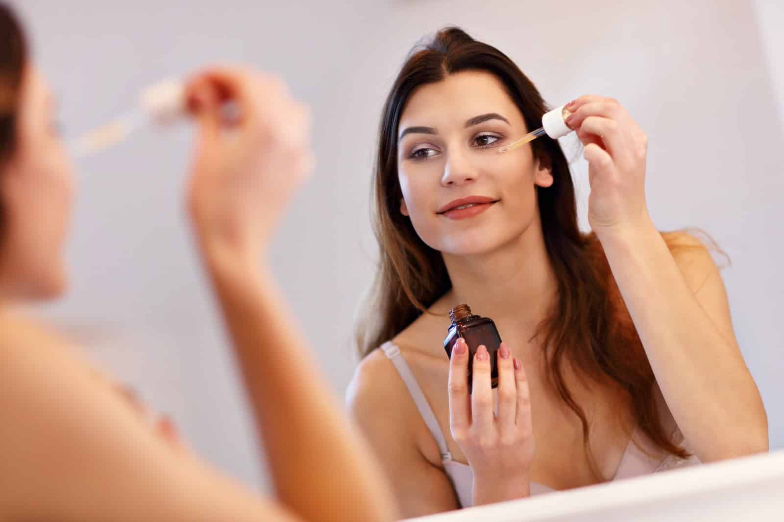 Woman applying make-up