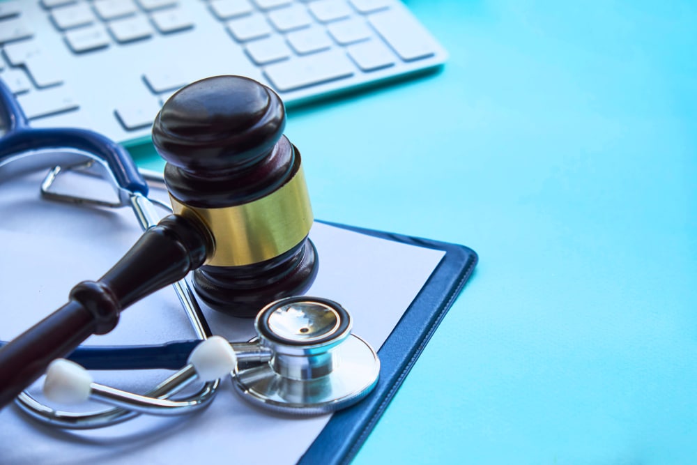 Gavel,And,Stethoscope.,Medical,Jurisprudence.,Legal,Definition,Of,Medical,Malpractice.
